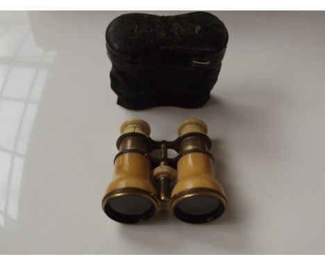 Vintage cased ivory affect opera glasses.