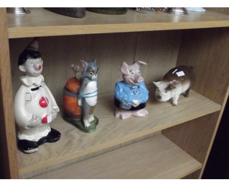 Collection of vintage money boxes, to include Tom & Jerry