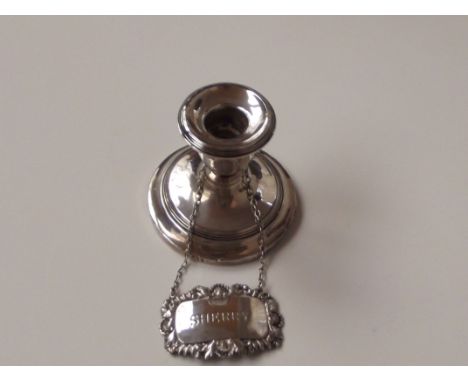 Silver dwarf candle stick and silver cherry label