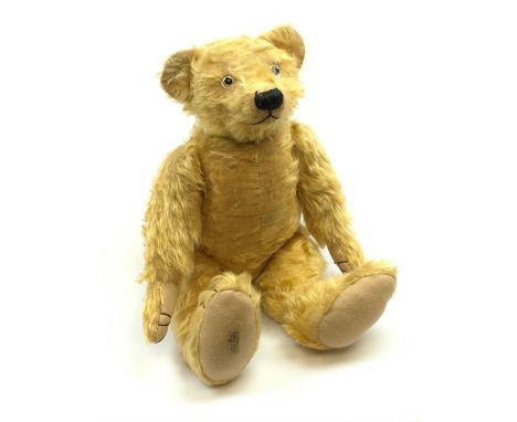 Alpha Farnell Toys large blonde mohair teddy bear with glass eyes, vertically stitched nose and mouth and jointed limbs with 