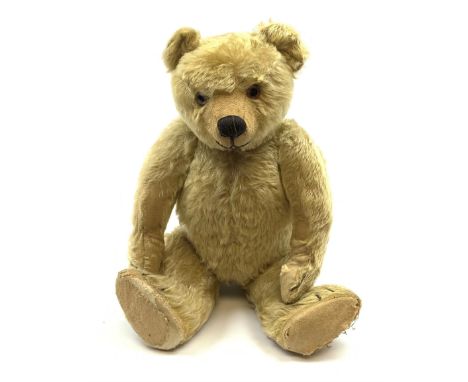 Chad Valley large teddy bear c1930s with wood wool filled blond mohair body, jointed swivel head with glass eyes, shaved muzz