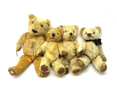 Four English teddy bears 1930s-50s comprising Chiltern with revolving head, plastic eyes and plastic dog type nose, jointed l