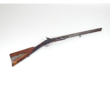 A 24 bore saddle ring carbine, with heavy twist barrel and patch box to gun butt.