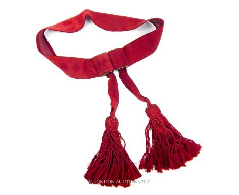 A Colour Sergeant's sash in maroon with brass clasps.
