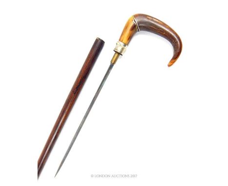 A 19th century horn handled sword stick, with short blade (31cm long).