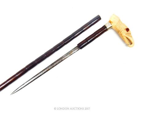 A faux bamboo sword stick with short blade (25cm long).