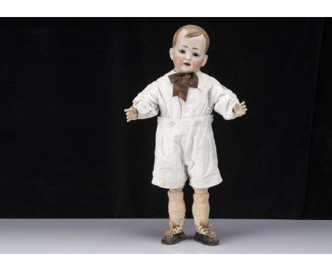 A rare large Kley & Hahn 166 character boy, with brown sleeping eyes, light brown painted and moulded side parted hair, joint