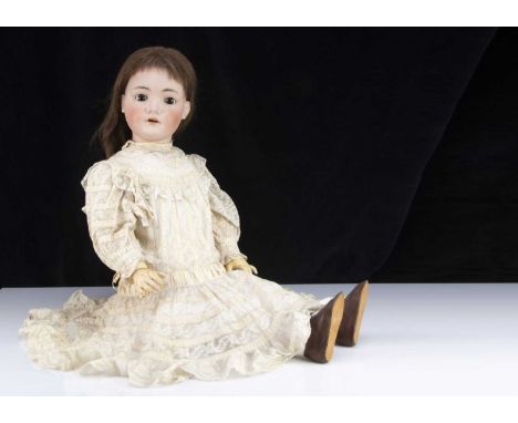 A very large Simon & Halbig for Kammer & Reinhardt child doll,  with brown sleeping eyes, moulded and brown painted eyebrows,