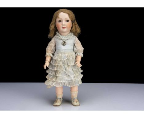 A Unis 306 Jumeau 1938 Princess doll, with brown sleeping flirty eyes, light brown brows, closed mouth the top lip painted da