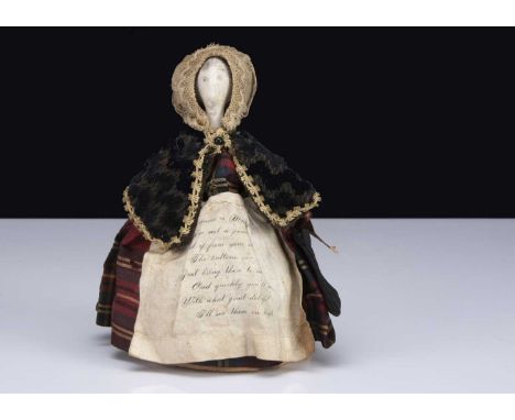 A rare 19th century Miss Piper clay pipe sewing/shoe repair doll, the head a cay pipe with painted features, the nose the bas