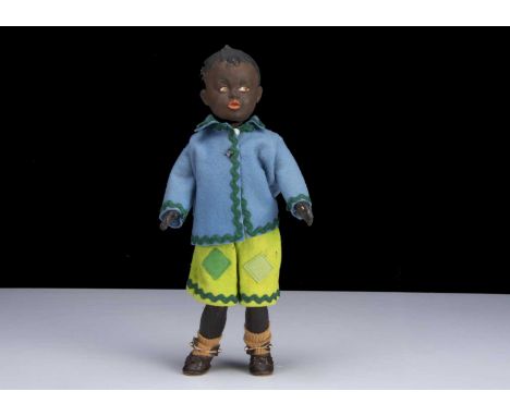 A Gebruder Heubach 7671 brown character boy,  with light brown intaglio side glancing eyes, closed full lipped mouth, quizzic