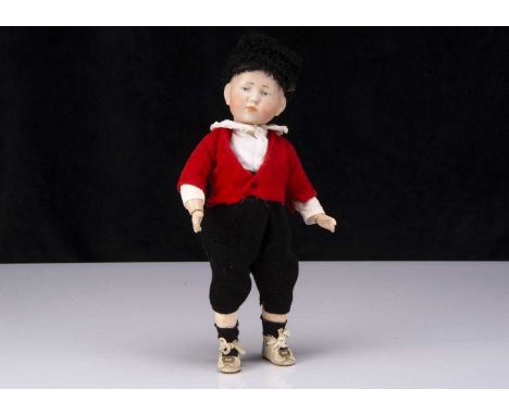 A Kammer & Reinhardt 101x character boy, with blue painted eyes, single dash brown painted eyebrows, closed mouth, bald solid