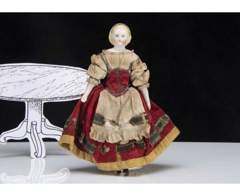 A mid 19th century Simon &amp; Halbig dolls’ house shoulder head doll, with blue painted eyes, blonde painted eyebrows, expos