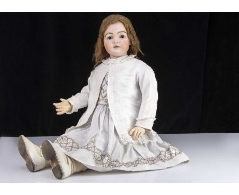 A very large Kammer & Reinhardt 192 child doll,  with brown sleeping eyes, brown brows, well modelled features with protrudin