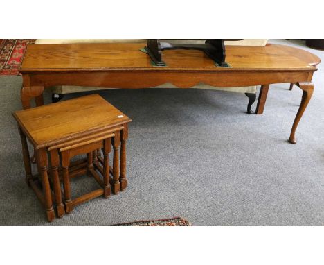 An Oak Hall Bench, in 18th century style, with moulded one piece rectangular seat, shaped apron, and cabriole supports, 186cm