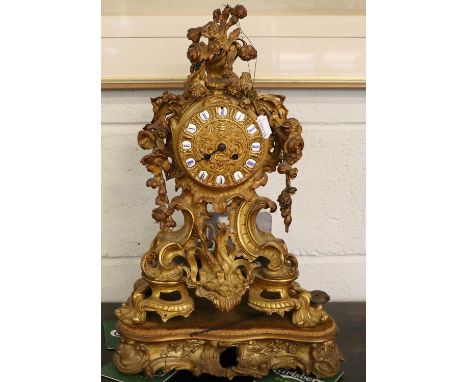 A French Ormolu Striking Mantel Clock, 19th century, the cast dial with blue Roman numeral cartouches, dial signed at 6 o'clo