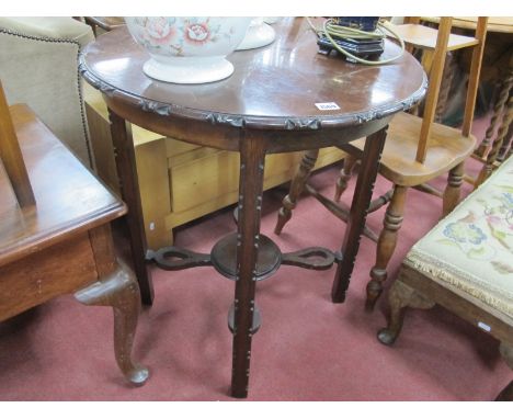 Edwardian Mahogany Occasional Table, with carved border to circular top, under shelf, 65cm diameter.