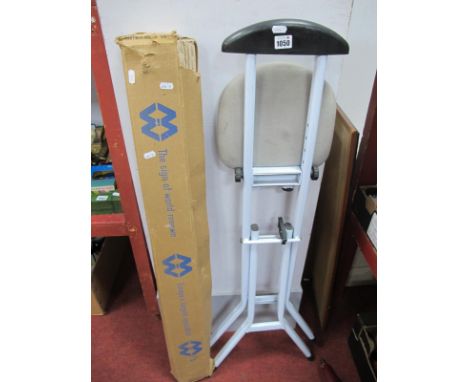 A Modern Perching Stool, in white, along with an action projector screen.