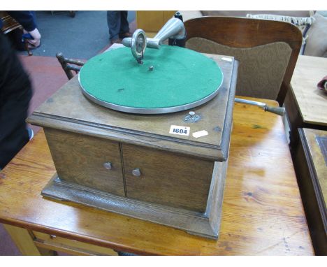 An Early XX Century H.M.V. Oak Cased 78rpm Table Top Record Player, (with soundbox and wind-up handle).