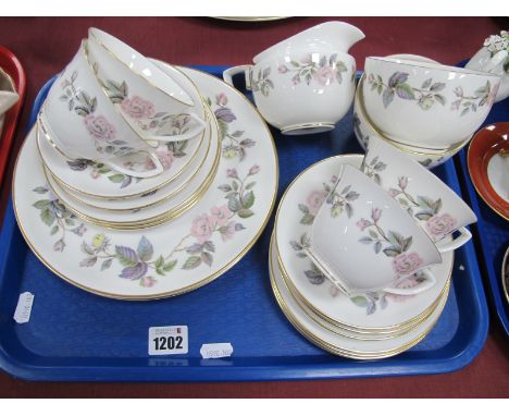 Royal Worcester June Garland Four Setting Tea Set, including tea plates, two cake plates, jug and two sugar bowls, etc :- One