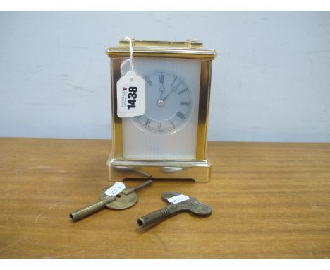 Elliott Carriage Clock Timepiece, with brushed brass case, French escapement, 'S' supports to fall handle, 12cm wide.