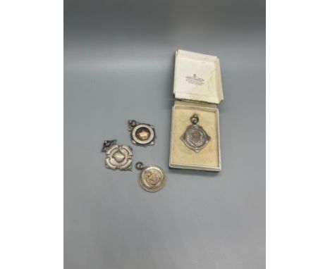 Selection of four vintage silver fobs 