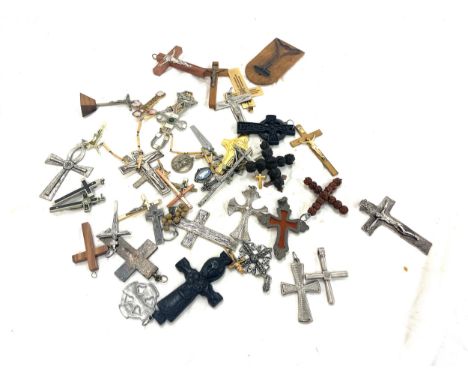Approximately 35 antique and vintage religious crucifix and cross pendants etc 