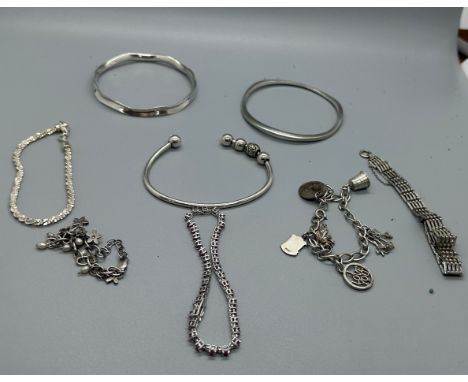 Selection of assorted silver bracelets 