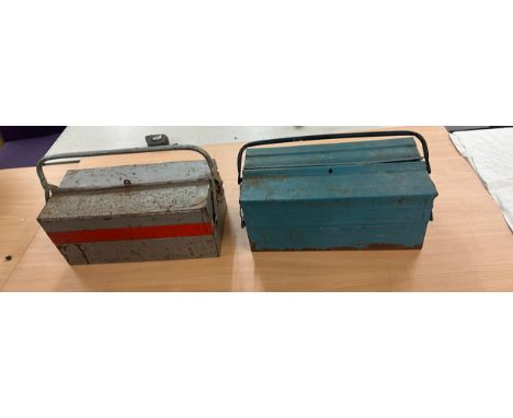 Selection of assorted tools in metal tool boxes 