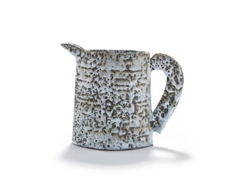 § Emmanuel Cooper O.B.E. (British 1938-2012) Jug, 2002 stoneware, volcanic glaze(21cm high, 26cm wide (8.25in high, 10.25in w