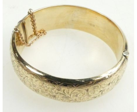 9ct gold hallmarked hollow bangle. Weight 25.5 grams