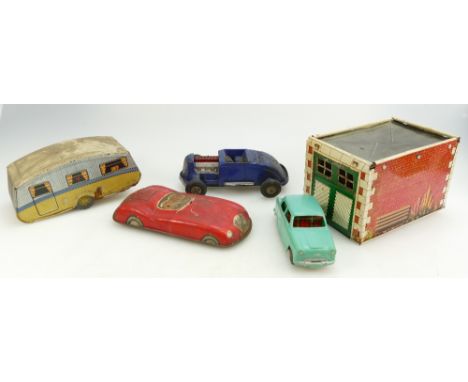 A collection of 1950's and 60's tinplate items to include Mettoy Garage, Caravan, Marx Hotrod, 1959 MGA and plastic bodied Au