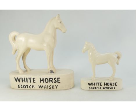 White Horse Scotch Whisky ceramic advertising figure of horse, height 22cm together with similar smaller item. (2) 