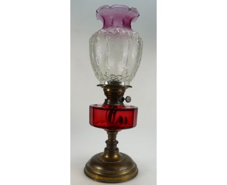 19th century cranberry glass lamp base on brass base with purple glass shade