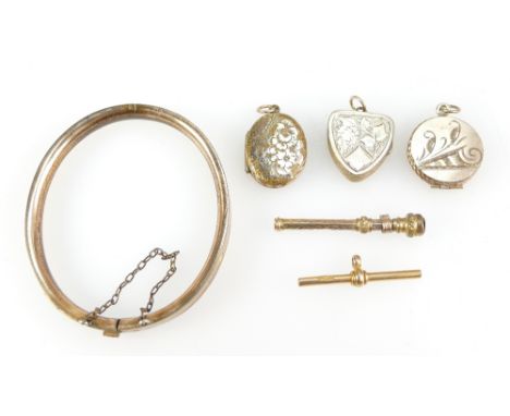 A collection of Victorian items including lockets, yellow metal T-bar, propelling pencil, bangle etc (6)