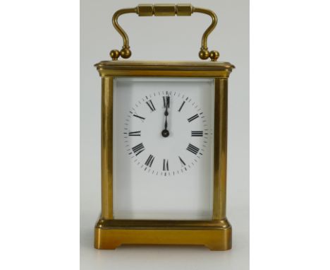 Carriage clock in brass case, with key. Not working. Lever escapement trips through and balance swings and appears intact. 12