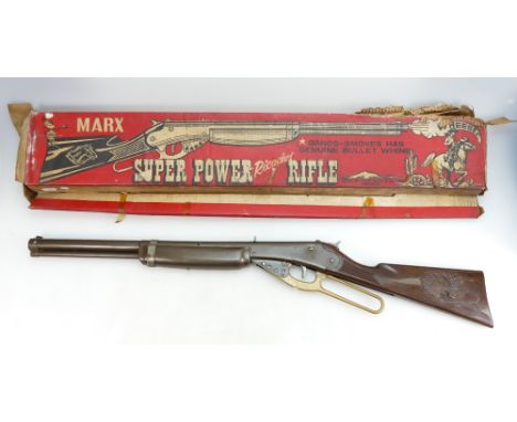 Marx Super Power Ricochet Rifle: Bangs, Smokes with genuine bullet whine made from metal in original box (box worn)