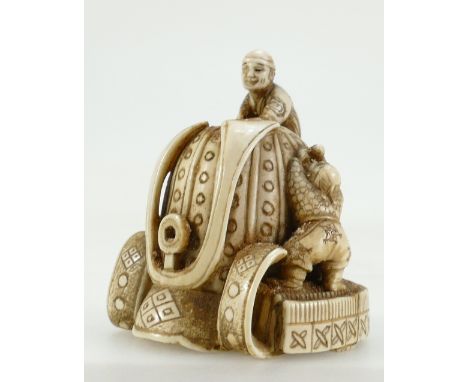 Japanese carved ivory Netsuke with signature to base. 5cm x 4.5cm wide approx. Early 20th century.