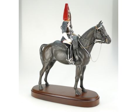 Royal Doulton Connoisseur model of mounted Queens Guardsman "Blues and Royals", height 38cm