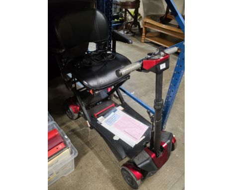 ELECTRIC 4 WHEEL FOLDING SCOOTER WITH ORIGINAL RECEIPT AND GUIDE BOOK, WITH CHARGER AND IN WORKING ORDER