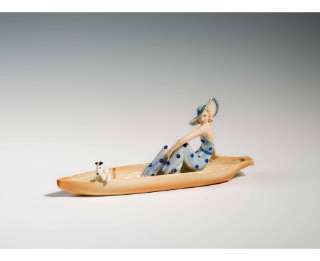 Stephan Dakon"Elegante Dame mit großem Hut und Foxterrier (in einem Boot sitzend)"Friedrich Goldscheider, Wien, um 1935Kerami