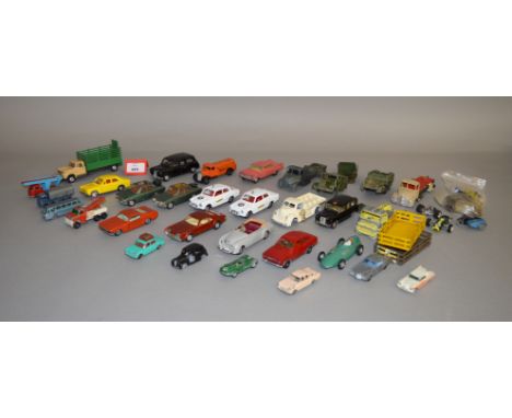 Twenty five unboxed playworn diecast models by Dinky, Corgi, Lesney and others, including a Chad Valley diecast 'Wee-Kin' mil