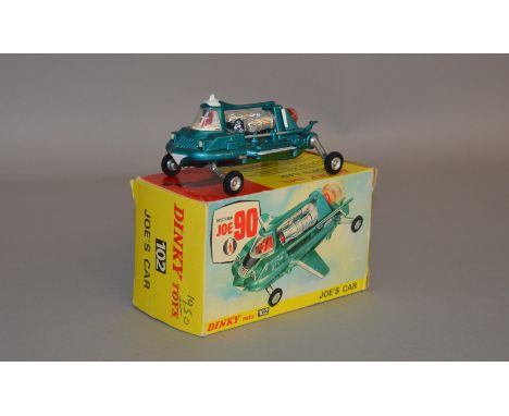 Dinky 102 'Joe 90' Joe's Car with aqua body. Diecast model is VG, some small patches of paint wear, on G inner pictorial stan