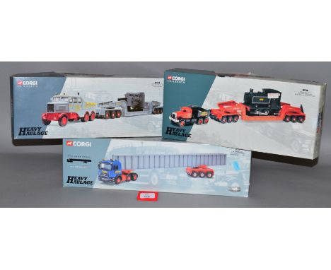 Three boxed Corgi diecast model trucks in 1:50 scale from their 'Heavy Haulage' series, 31007 Diamond T 'Annis', 17602 Scamme