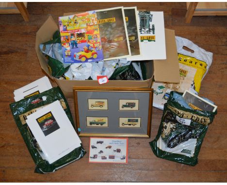 An excellent quantity of Lledo catalogues, together with a framed print.