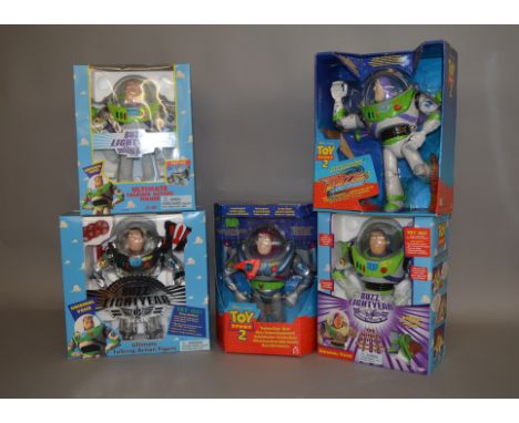 Thinkway Toy Story Buzz Lightyear figures: Buzz Lightyear, first issue; Buzz Lightyear Infinity Edition; Intergalactic Buzz L
