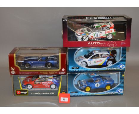 Five 1:18 scale diecast model cars: AutoArt Toyota Corolla WRC; Road Legends Shelby Cobra; Bburago Citroen Xsara WRC; Solido 