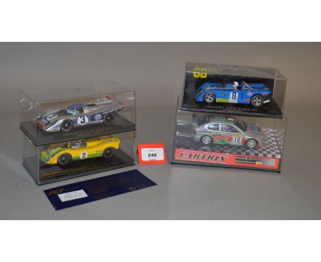 Four slot cars: Cartrix 0304-R; Fly C54; GBTrack GB11; Fly Porsche 908 (missing inner cardboard sleeve from box). VG-E, boxed