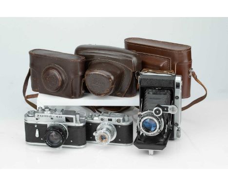 A Small Selection of Soviet Cameras, A Small Selection of Soviet Cameras,including a Moskva 5, body G-Vg, shutter sticks on s