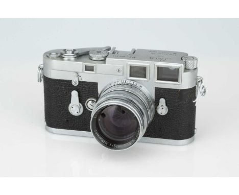 A Leica M3 Rangefinder Camera, A Leica M3 Rangefinder Camera,chrome, serial no. 864234, with Leitz Summarit f/1.5 50mm lens, 